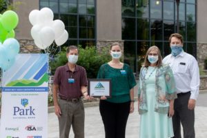 Mercy employees accept the 2020 Sky High Growth Award from the Asheville Chamber of Commerce